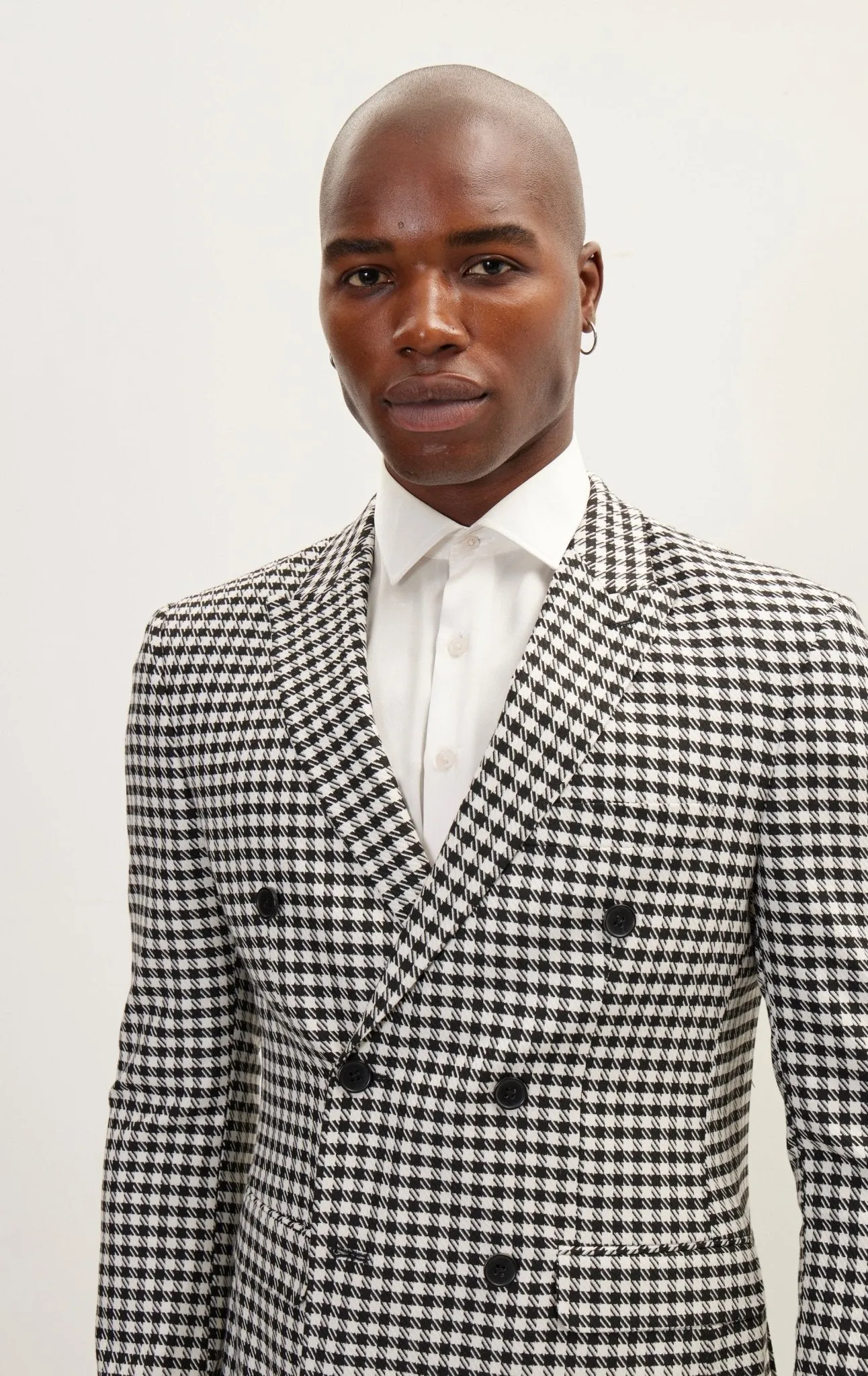 Double-Breasted Houndstooth Suit With Black Pants